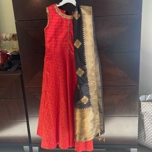 Red big girl’s Indian suit with black and gold dupatta